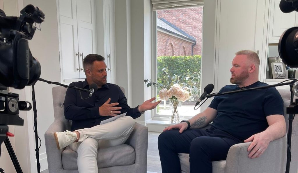 Darren Fletcher (left) interviews former Manchester United star and England International Wayne Rooney.