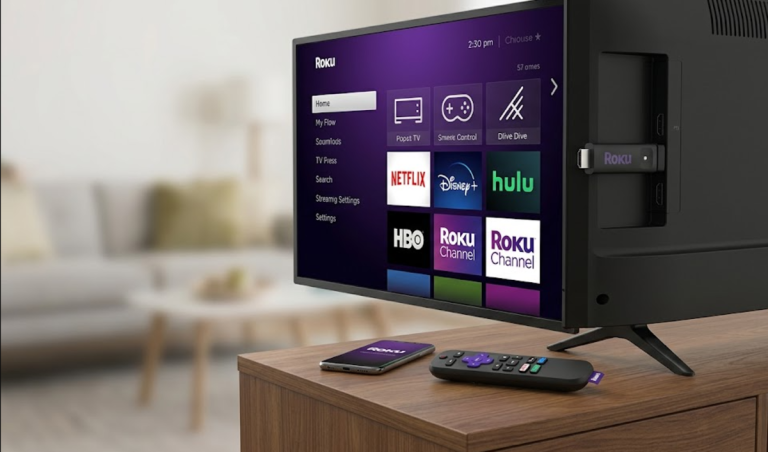 Roku streaming stick inserted in a TV